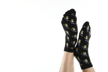 Male legs in funny socks isolated on white background