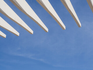 Modern white structure with blue sky and copy space