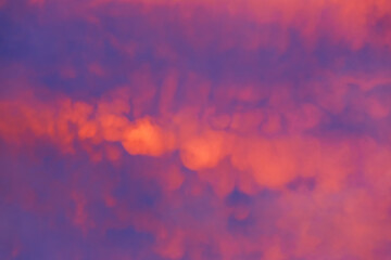 Abstract warm color cloud on blue sky in sunset time background.