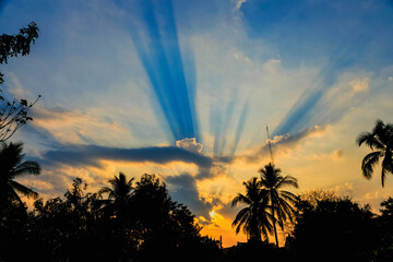abstract sunbeam on cloudy sky on sunset time background.
