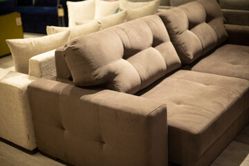 Soft sofa. Furniture in the store. Interior in the room.