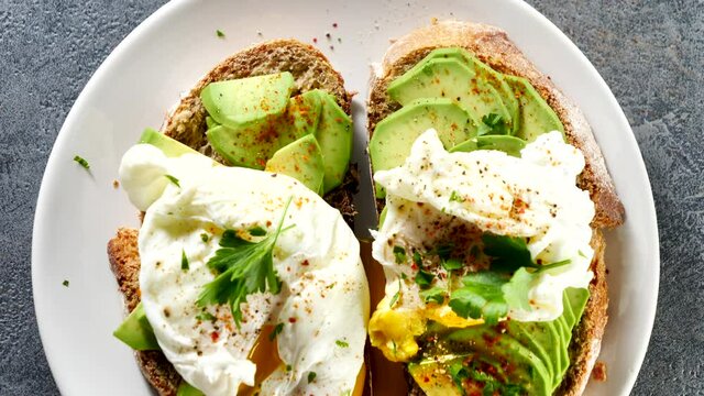 bread toast with avocado and poached egg