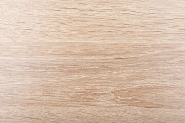 Top view of bright beige wooden table surface with space for text