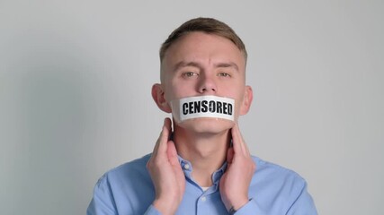 A man gluing his mouth with tape with the words Censorship