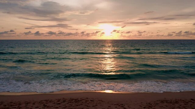 Phuket Thailand. Beautiful tropical beach with sunset sky. Beautiful Phuket beach is famous tourist destination at Andaman sea summer concept.