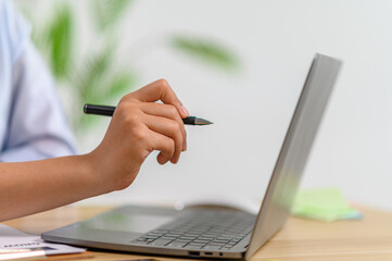 female employee working with laptop