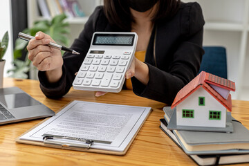 Real estate salesman calculator to inform customers the cost that the customer has to pay after...