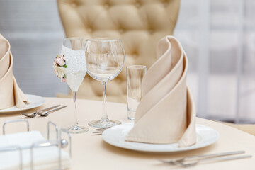 Luxury table setting for dining in pastel colors close up 