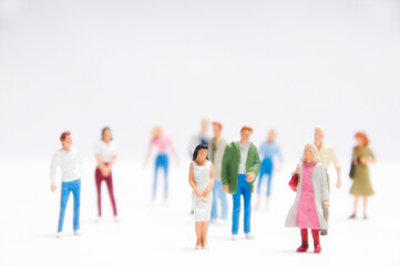 miniature figurines of a people crowd, social media and social networking concept