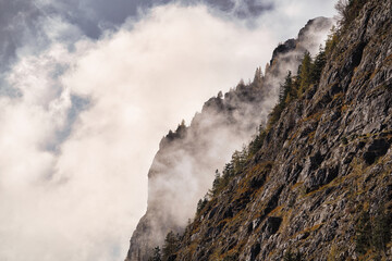 clouds and fog over the mountains in autumn