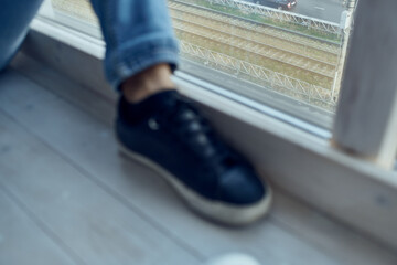 foot on the windowsill close-up