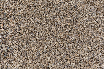Background from rubble. Small gray stones on a background