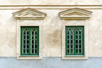 Fototapeta na wymiar Two Symmetrical Green Vintage Windows