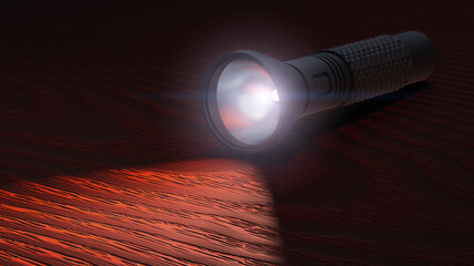 flashlight on a wooden background
