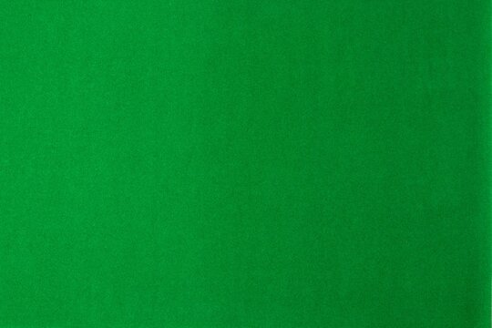Background texture of green velvet paper. Copy space