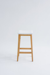 Wooden bar stool on the white background.