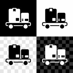 Set Hand truck and boxes icon isolated on black and white, transparent background. Dolly symbol. Vector