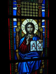 Obraz na płótnie Canvas A stained glass window with Jesus Christ