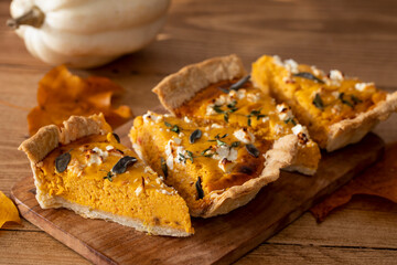 Pumpkin tart with feta cheese and herbs