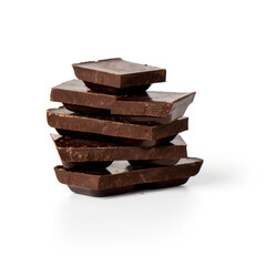dark chocolate pieces isolated on white