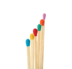 Matches with colorful heads on white background