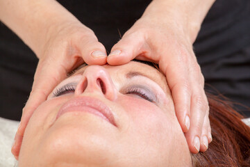 Mature Woman having relaxing massage