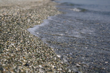 different beautiful sea views in Greece of the calm sea and with waves