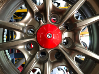 Close up vie of alloy car rim. Sporty design. Selective focus