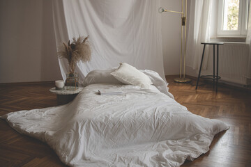 Cozy natural casual interior bedroom with fabric background and wooden floor - obrazy, fototapety, plakaty