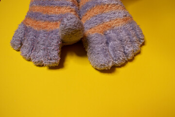 women's warm socks on a yellow background
