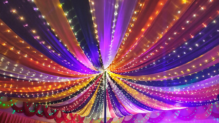 Gorgeous celebration background with striking array of glittering lights for festival events,musical party multi color background photo.