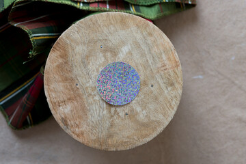 Naklejka premium spool with cloth ribbon and glitter paper circle