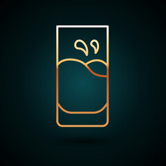 Gold line Glass with milk icon isolated on dark blue background. Vector