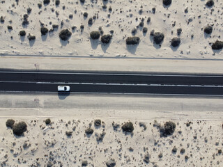 Aerial top view of roads through sand dunes in Corralejo, Fuerteventura, Canarian Islands
