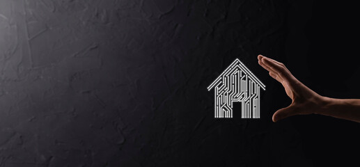 Hand hold house icon.Smart home controlled, intelligent house, and home automation app concept.Pcb...