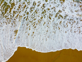 Beach with turquoise sea water, aerial drone shot, Top view of beautiful white sand