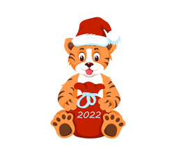 A cute tiger in a Santa Claus hat holds a bag with gifts in its paws. Isolated on a white background. Flat style. Christmas, new year. 2022. red gift bag. Vector illustration.