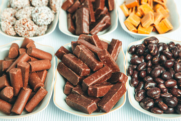 Assortment of delicious chocolate candies background. Chocolate candy isolated 