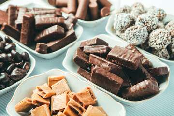Assortment of delicious chocolate candies background. Chocolate candy isolated 