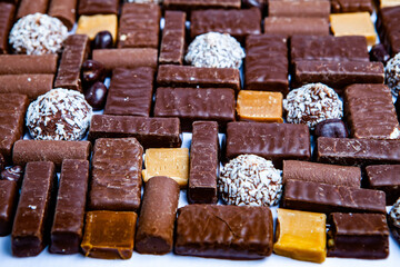 Assortment of delicious chocolate candies background. Chocolate candy isolated 