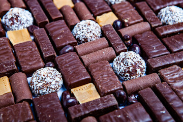 Assortment of delicious chocolate candies background. Chocolate candy isolated 