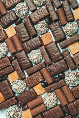 Assortment of delicious chocolate candies background. Chocolate candy isolated 