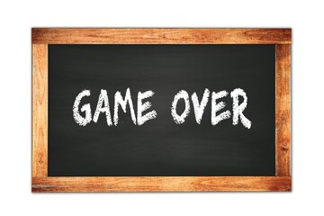 GAME  OVER text written on wooden frame school blackboard.