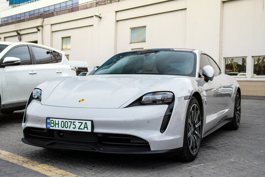 Odessa, Ukraine - September 5, 2021: Electric car Porsche Taycan in the city