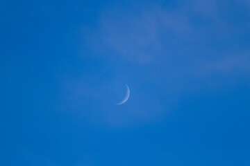 Obraz na płótnie Canvas Moon in the blue sky
