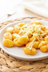 Gnocchi with cheese mediterranian food. Cooked gnocchi with butter and green onions.