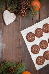 winter background chocolate chip cookies for Christmas on wooden background