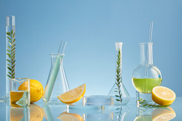 Blue Background Cosmetic laboratory research and development with Lemon extract. Science bio skincare cream serum product with citrus extract. Natural organic beauty cosmetics concept.