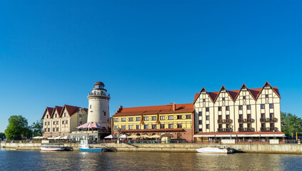 Obraz premium Fishing Village is ethnographic and trade-craft center in Kaliningrad, Russia on the banks of the Pregolya river. Architectural style of the pre-war East Prussian city of Konigsberg