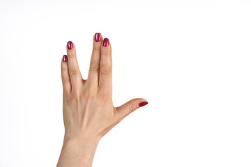 A man hand doing the Vulcan salute on a white background. Vulcan hand salute against. Spock hand....